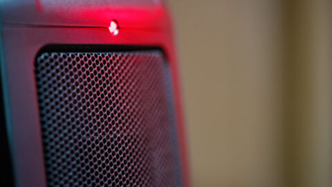Electric ceramic mini space heater for desk use, blowing warm air for dry eye relief